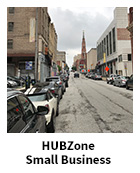 HUBZone Small Business slide, streetview of an urban environment with buildings and cars