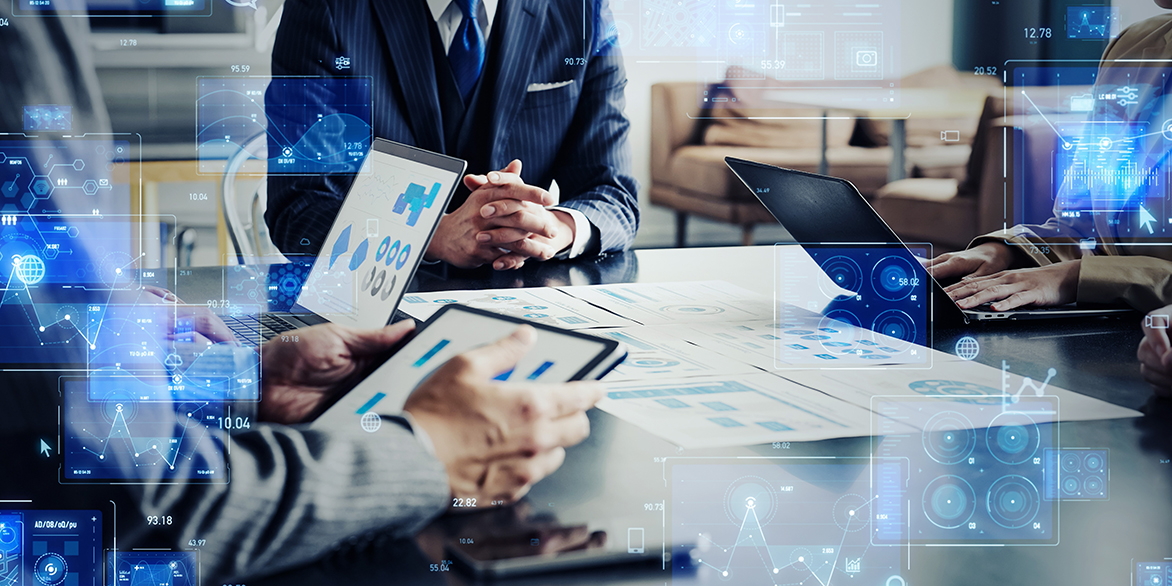 Man typing at computer