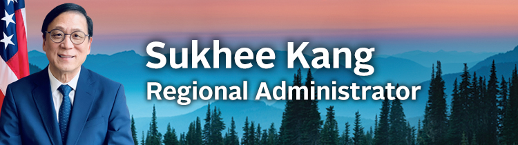 Decorative Banner with name and image of  Regional Administrator, Sukhee Kang (January 2023)
