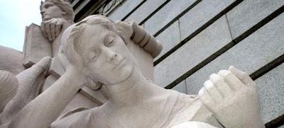 Sculpture of a woman reading a book at the US Courthouse, Providence, RI