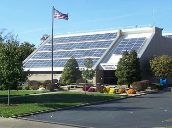 Exterior entrance and solar-paneled roof of the S