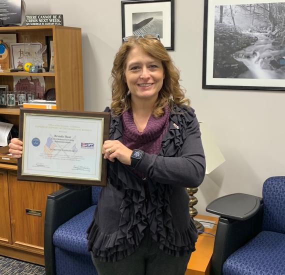 Brenda Haar was presented with a Patriot Award certificate by ESGR.