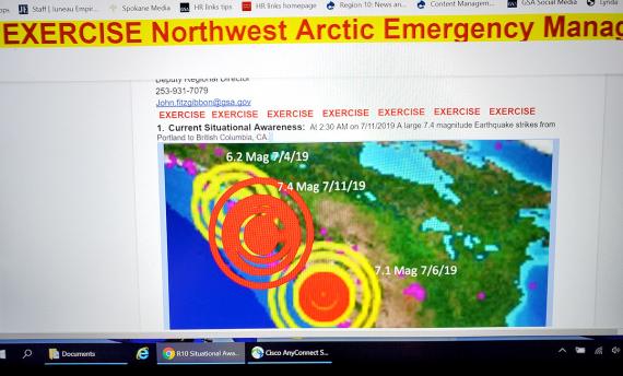 Photo of a computer screen showing a map with the text at the top, EXERCISE Northwest Arctic Emergency Management