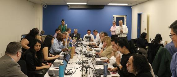 Employees on the response and recovery teams gather to execute the region’s Continuity of Operations Plan during a simulated emergency annual exercise on May 16. (Photo by Amanda Smith)