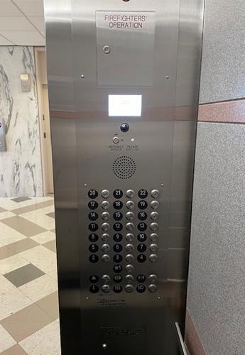 Elevator at the James A. Byrne U.S. Courthouse, showcasing the RATH Communication screen.