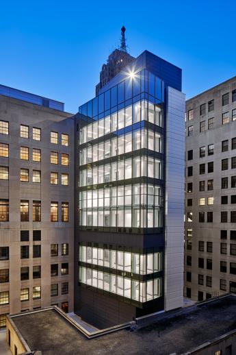 Exterior overhead shot of Levin U.S. Courthouse courtyard and new stair tower at night