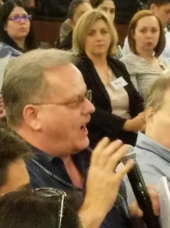Close up of questioner in audience