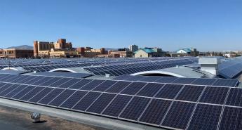 Rooftop array of solar panels on the roof of Building 810