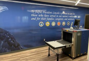 Security entrance with blue wall art and Lincoln quote