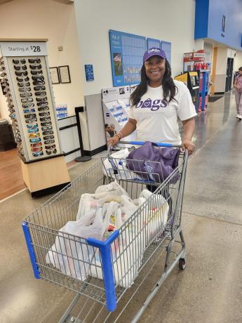 Tanya Burks building a giving society photo of her shopping for her charity work