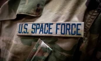 Space Force badge on a Soldier in fatigues left chest