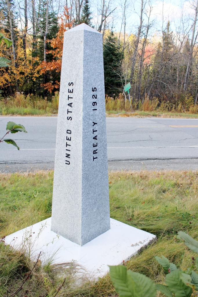 A mile marker with the year 1929 on it