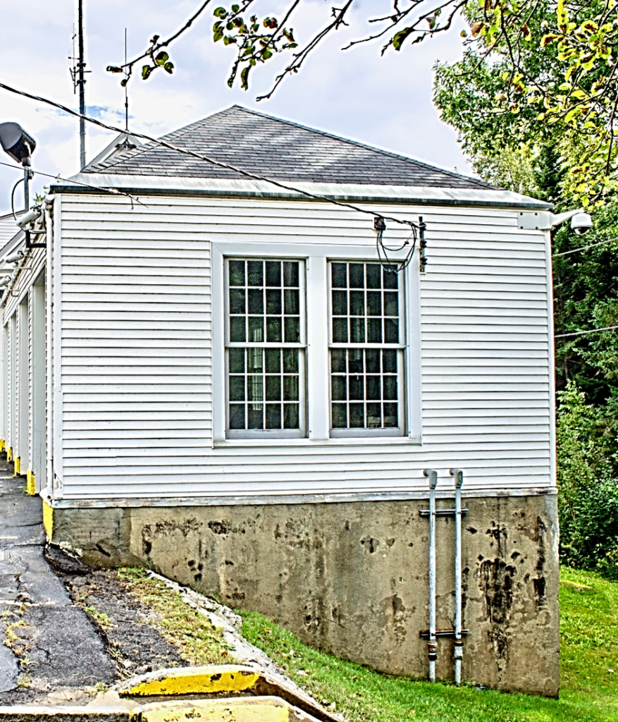 side of white building